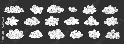 Crayon cloud set hand drawn naive kids, baby, school background design. Childlike scribble white chalk clouds drawn on blackboard, kid drawings. 