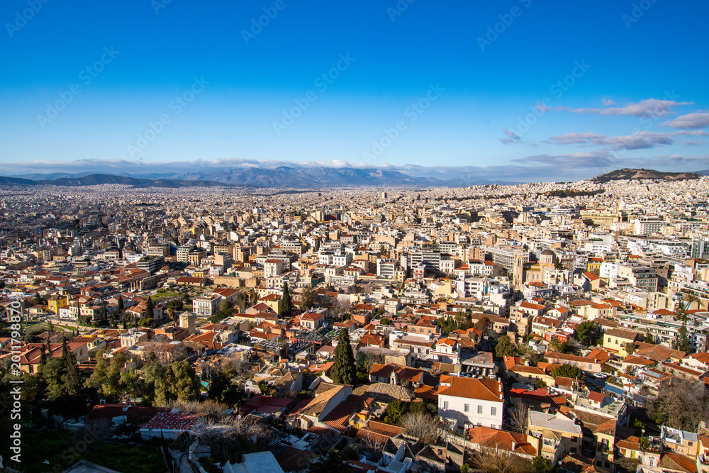 Fototapeta premium Cityscape view of Athens, Greece as seen from the top of the Acropolis of Athens site.
