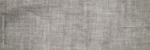 Photos Linen fabric displayed for use in clothing and home decor in a textile shop duri
