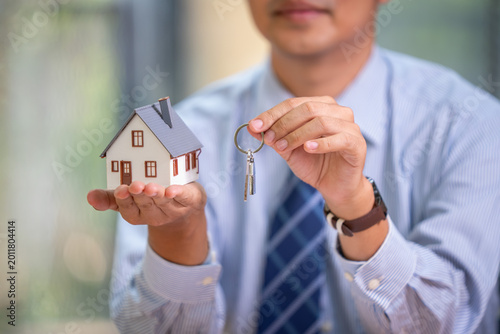 Real estate purchase process explained office setting business image professional environment close-up view home ownership concept