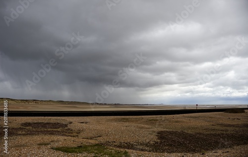 Canvas Print Rain clouds over Camber Sands
