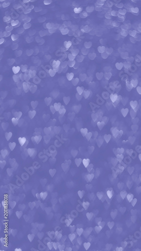 Blurred heart shape bokeh light in trendy Very Peri color. Abstract glitter background for romance, celebration, Valentine Day