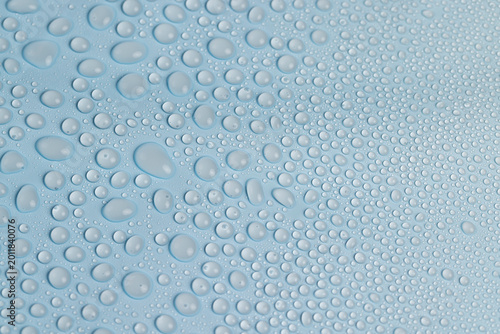 Принти на полотні wet blue plastic material for wrapping bouquets, water droplets