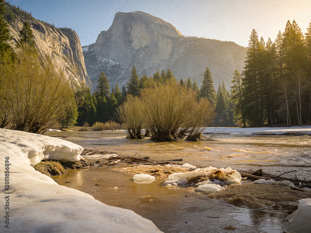 Fototapeta premium Majestic Granite Peaks and Rushing River Surge