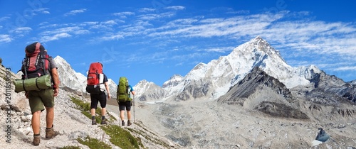 Photos Three hikers mount Everest base camp Nepal Himalaya