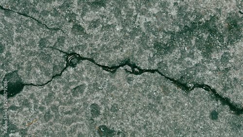Photography Deep asphalt crack representing mental fractures, trauma, and human fragility