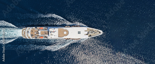 Bild auf Leinwand Aerial drone ultra wide panoramic photo with copy space of luxury yacht with woo