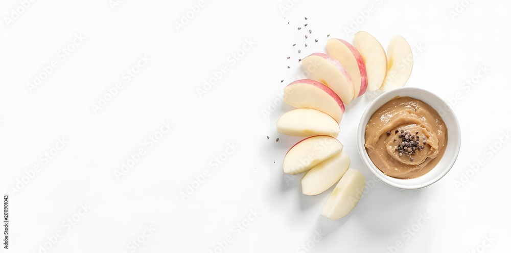 Fototapeta premium Fresh Apple Slices With Peanut Butter Healthy Snack Concept