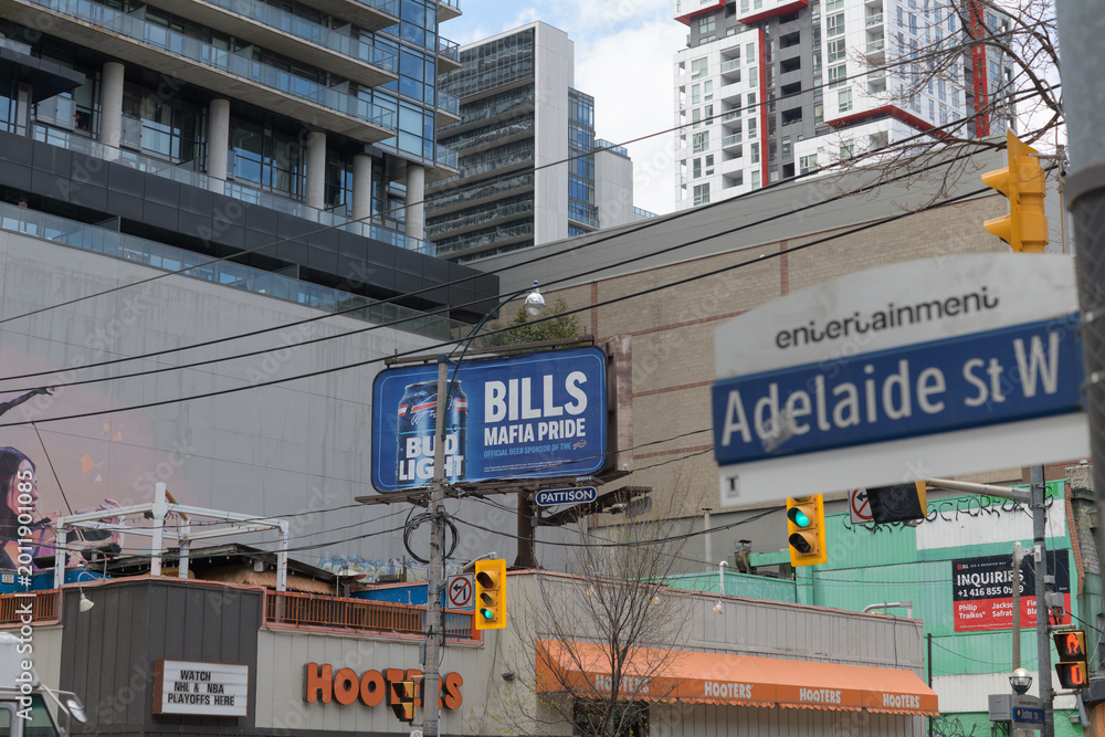 Fototapeta premium signs near Hooters, a sports bar (280 Adeliade St W) Downtown Toronto