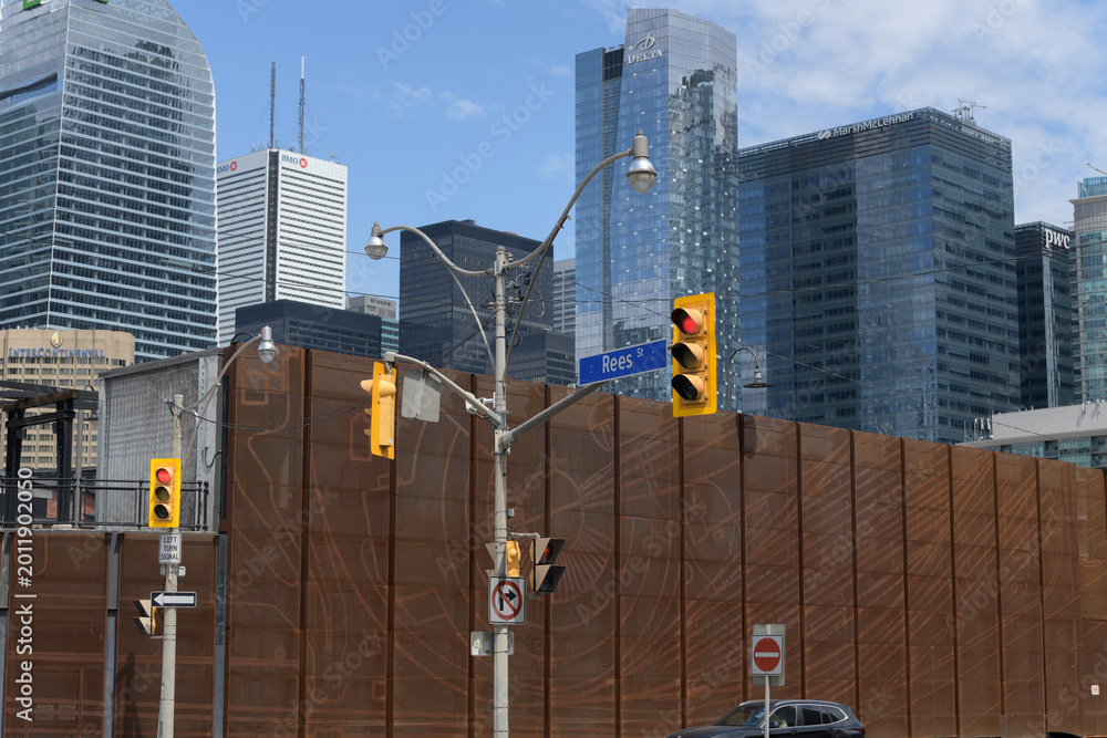 Fototapeta premium looking northeast from corner of Lake Shore Blvd W and Rees St to Roundhouse Park and office, residential, and hotel buildings, Toronto