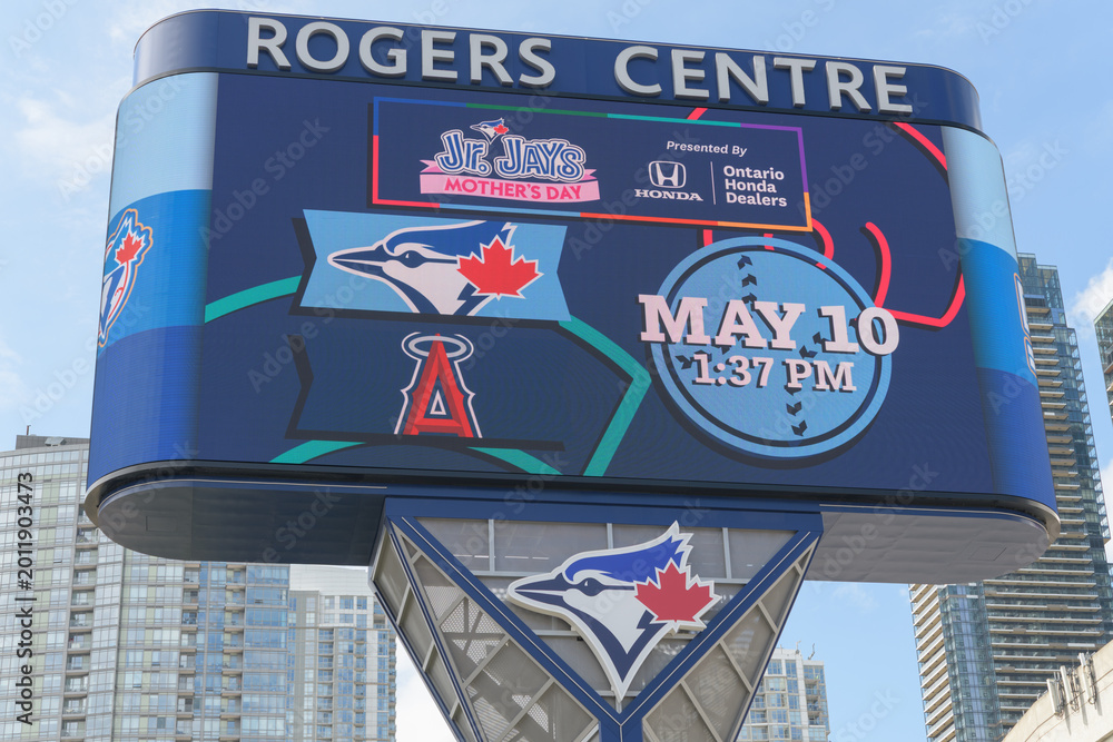Fototapeta premium Gardiner / Rogers Centre LED Pylon with baseball game promotion for the Toronto Blue Jays (digital billboard located at Bremner Blvd and Rees St) - May 10