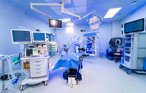 Konstfotografi Empty high tech hospital surgery room with monitors and robot