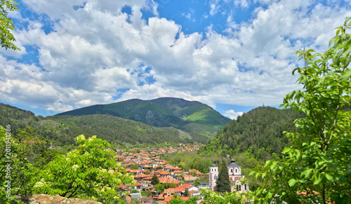Canvastavla sunny view from above, red roofs and orthodox church, mountain, blue sky,