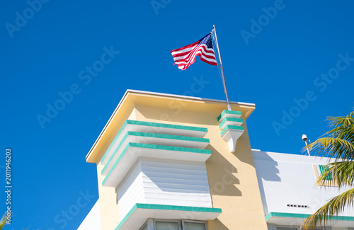 Ocean drive. Miami Beach in Ocean Drive Florida. Art Deco building architecture. Architectural building. Art deco. Architectural district Art Deco. Modern building of Miami beach with USA flag