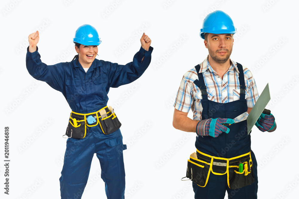 Fototapeta premium Two construction workers wear blue hard hats
