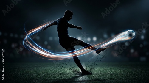 Futebolista em silhueta chutando a bola, com efeitos de luz coloridos.