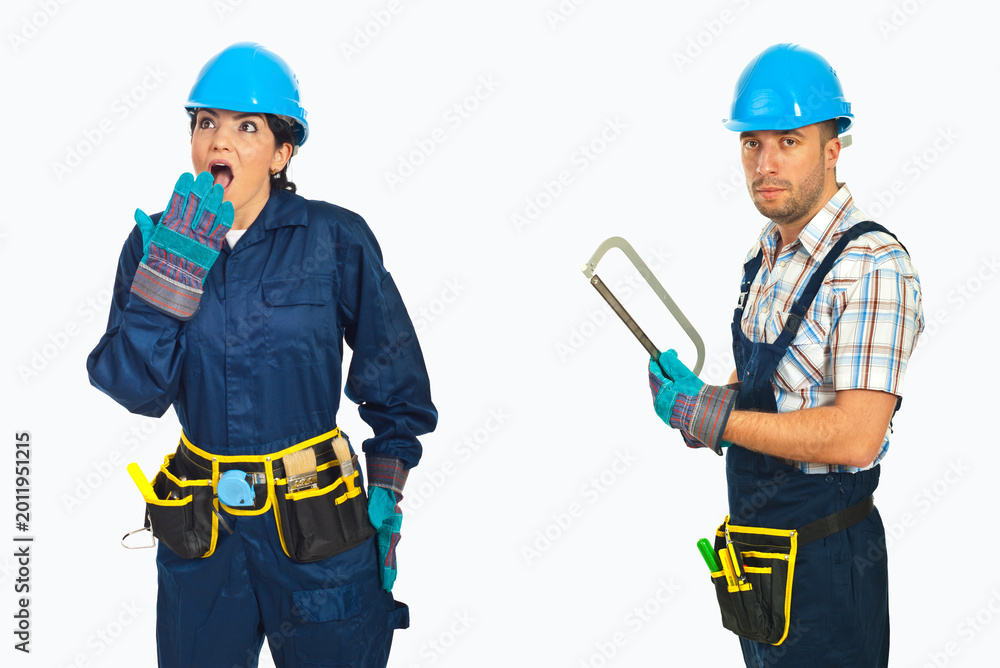 Fototapeta premium Two workers in blue gear stand side by side