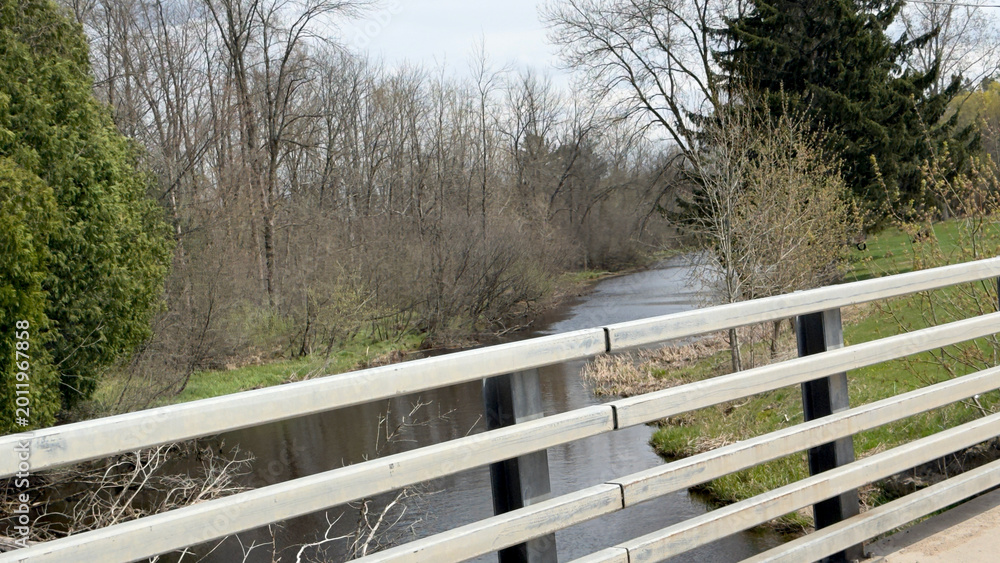 Fototapeta premium bridge over the creek in springtime