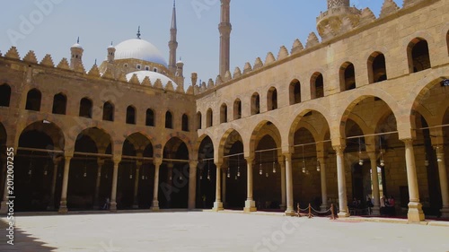 Slow upward camera movement revealing the grand mosque courtyard and domes in Cairo, Egypt, captured in cinematic 4K during travel.