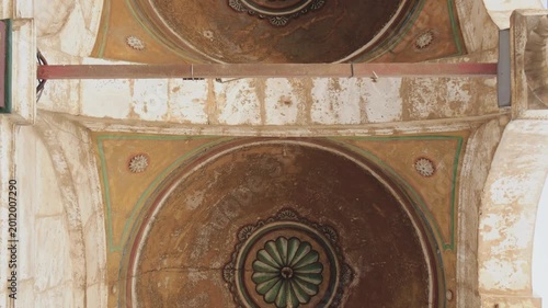 Ornate mosque ceiling and hanging lamp in Cairo, Egypt, captured in slow motion 4K during travel.