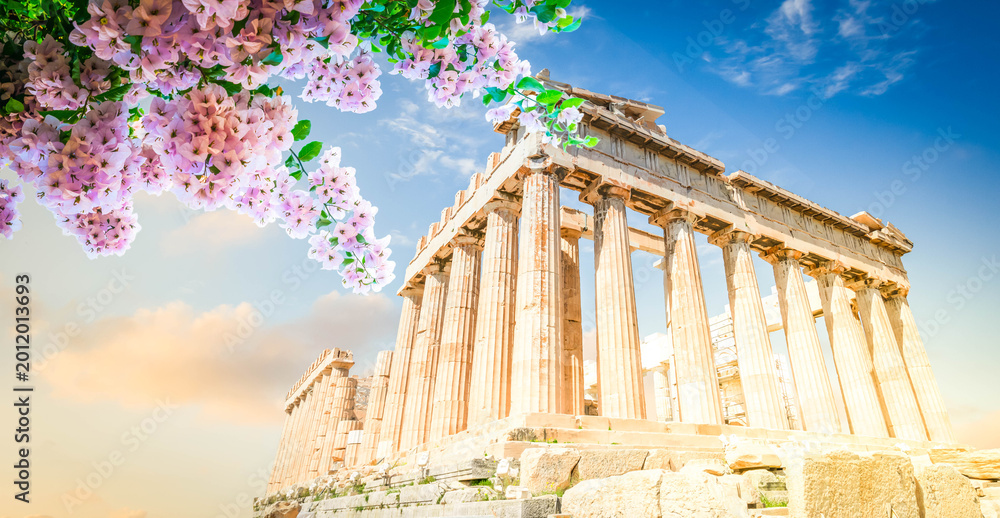 Fototapeta premium Parthenon temple over bright blue sky background, Acropolis hill, Athens Greece, web banner format