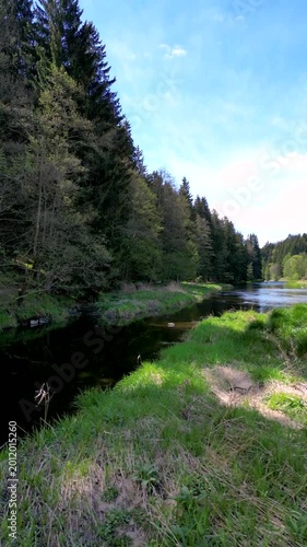 Drone flight over Regen river near Regen town in Bavarian Forest landscape in Lower Bavaria Germany