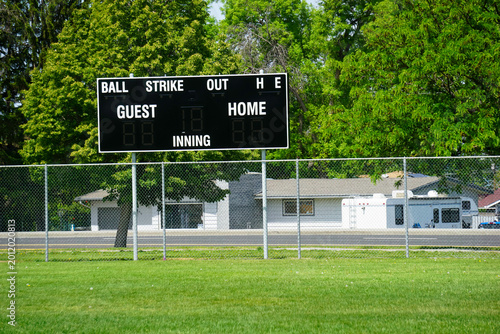 Baseball and softball sports scoreboard at park