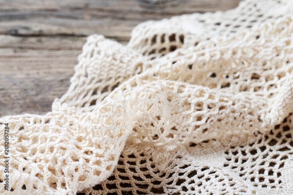 Fototapeta premium A beautiful lace on wooden background, copy space.