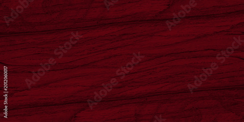 Fotografija Deep red mahogany wood texture background with natural wavy grain patterns