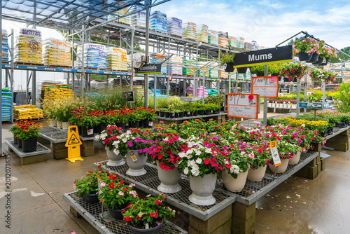 Fotografía Garden Center Supply Section At Gardening Supply Store Featuring Plants Tools An