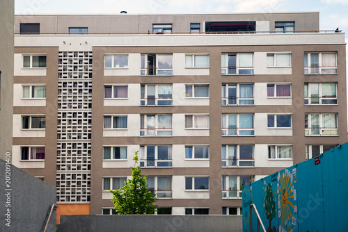 Canvas Print Berlin, Germany, 5 May 2026,  The facade of a residential apartment building featuring socialist modernist architecture style in Berlin, Germany