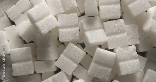 Sugar cubes close up studio shot over rotating