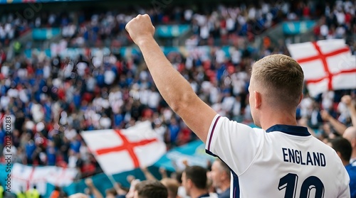 Passionate England football fan cheering with raised fist at a stadium during a major soccer tournament.
