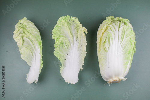 Fresh Chinese cabbage on green background.  Organic vegetable Healthy nutritional food.