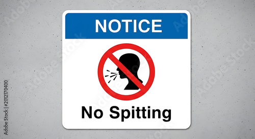 Notice sign prohibiting spitting with silhouette person