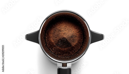 Close-up of shiny chrome espresso machine portafilter with used coffee grounds inside