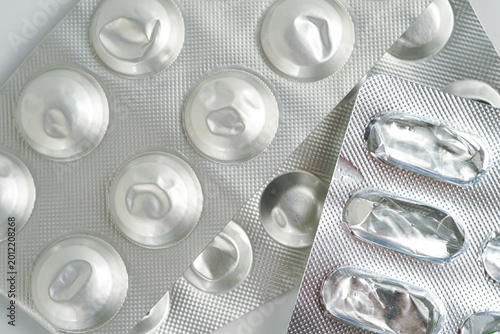 Blisterpack of capsule pills medical capsules pills Metallic blister packs of used medication