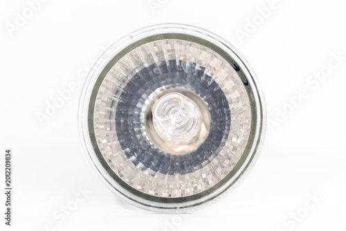 Fotografi halogen MR16 light bulb with faceted glass reflector isolated on white backgroun