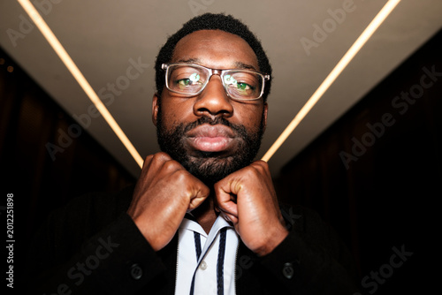 Photos Black man looking serious in a portrait