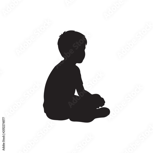 Photos Kid boy sitting silhouette isolated on white background