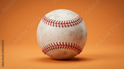 Baseball on orange surface