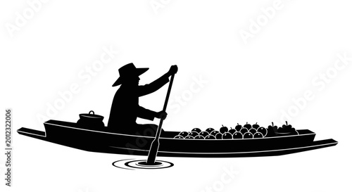 Floating market vendor rowing a boat full of produce