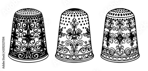 Thimble set with ornate silver details featuring sewing, needlework, craftsmanship with traditional and intricate design
