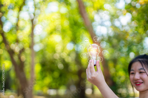 light bulb against nature, icons