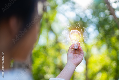 light bulb against nature, icons