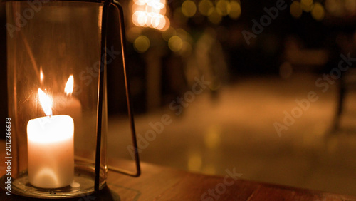Photography Burning White Candle in Glass Lantern on Outdoor Restaurant Table