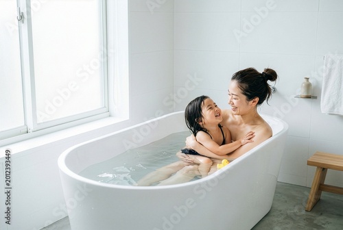 Japanese Parent and Child Enjoying Bath Time Together, Warm Family Bonding and Daily Life Concept