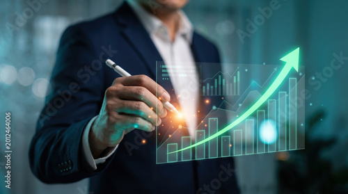 Business executive presenting futuristic financial growth visualization with upward arrow chart in modern corporate office, representing investment success, analytics, and business strategy