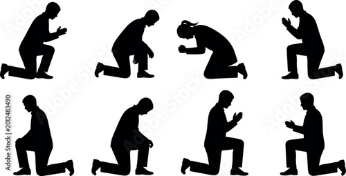 Cuadro en lienzo Silhouette of people kneeling in prayer or supplication