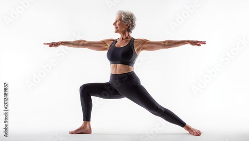 Senior woman practicing yoga isolated on white background